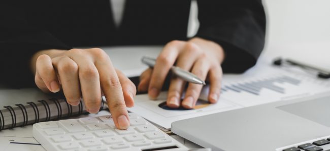 accountant or banker calculating or checking balance. Bookkeeper or financial inspector making financial report. Home finances, investment, economy, saving money or insurance concept bookkeeping