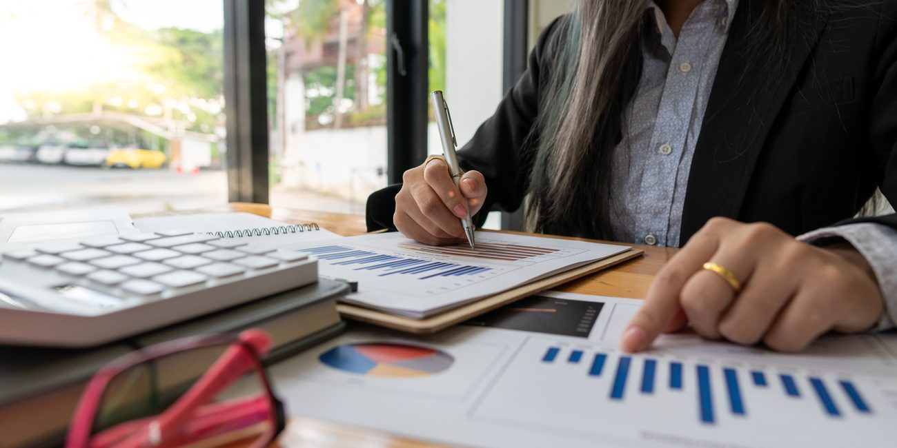 accountant or banker calculating or checking balance. Bookkeeper or financial inspector making financial report. Home finances, investment, economy, saving money or insurance concept bookkeeping