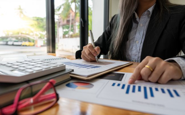 accountant or banker calculating or checking balance. Bookkeeper or financial inspector making financial report. Home finances, investment, economy, saving money or insurance concept bookkeeping